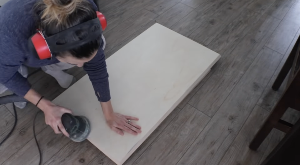 sanding the faces of the doors 